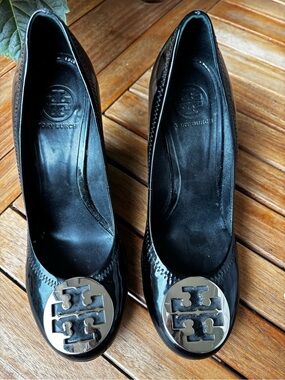 Tory Burch Black Patent Logo Cap-Toe Pump with Silver Medallion